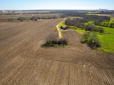 Aerial view with expansive acreage at 901 County Road 398 - Taylor Transitional 2, Taylor, TX