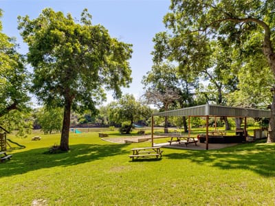 Primary bedroom at 9035 Fm 725 - McQueeney Camp, McQueeney, TX