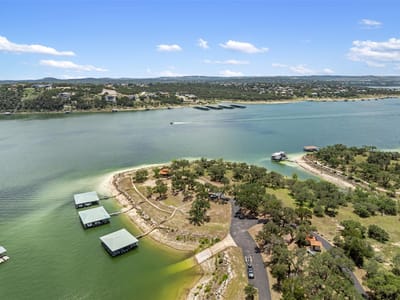 Primary bedroom at 906 Moonlight Bay DR - Coves On Lake Travis The Ph 1, Spicewood, TX