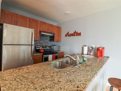 Primary bedroom at 909 Reinli ST Unit #221 - 1 bed 1 bath home