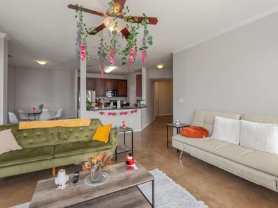 Living area at 910 W 25th St Unit #406 - 3 bed 2 bath home