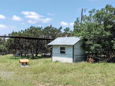 Primary bedroom at 932 High Country - High Country Ranches, Blanco, TX