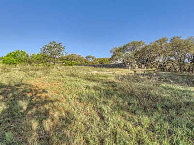Primary bedroom at Lot 18 South Cv - Lost Cove, Spicewood, TX