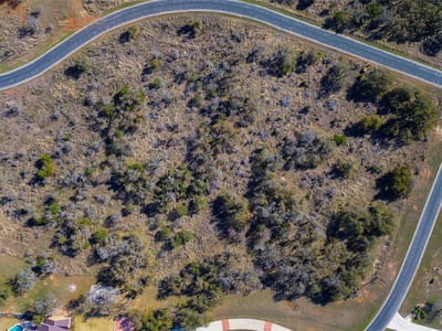 Primary bedroom at Lot 20 Comanche Rdg - The Bluffs at Round Mountain, Round Mountain, TX