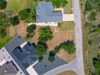 Primary bedroom at Lot Unit #50 - Granite Ridge at Packsaddle, Kingsland, TX