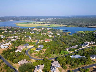 Primary bedroom at Lot 64 Wesley Ridge Dr - The Point At Ridge Harbor, Spicewood, TX
