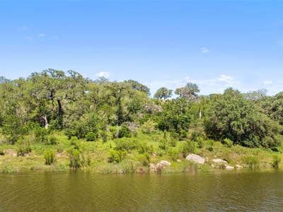 Primary bedroom at Lot 7 Pedernales Canyon TRL Unit #Lot 7 - Edward Gritten, Spicewood, TX