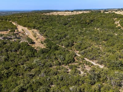 Primary bedroom at Lots 196-a, 198-a, 201-a Canyon Ridge Ct - Whitewater Spgs, Bertram, TX