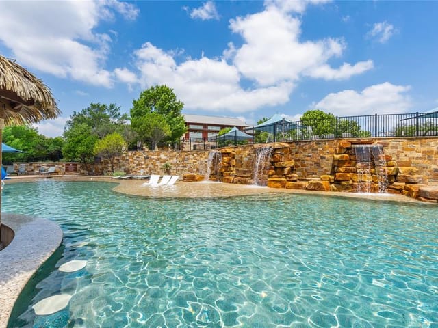 View 101 Cartwheel BND Unit #52 in Rough Hollow Vineyard Condos 101 Cartwheel BND Unit #52 - front exterior - Luxury home in Rough Hollow Vineyard Condos, Austin, TX