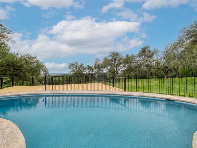 10306 D K Ranch RD - front exterior - Luxury home in Northwest Hills Ranch 1972 Vai, Austin, TX