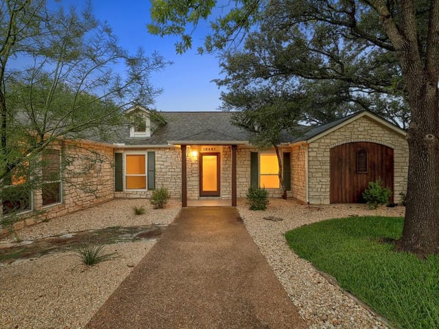 10401 Tweedsmuir DR - front exterior - Luxury home in Park At Spicewood Springs, Austin, TX