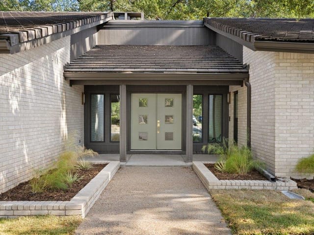 10707 Pinehurst DR - property photo 1 - Luxury home in Onion Creek Sec 03, Austin, TX