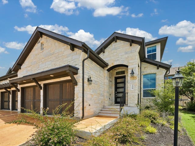 View 109 Beneteau DR in The Vineyards at Rough Hollow 109 Beneteau DR - property photo 1 - Luxury home in The Vineyards at Rough Hollow, Austin, TX