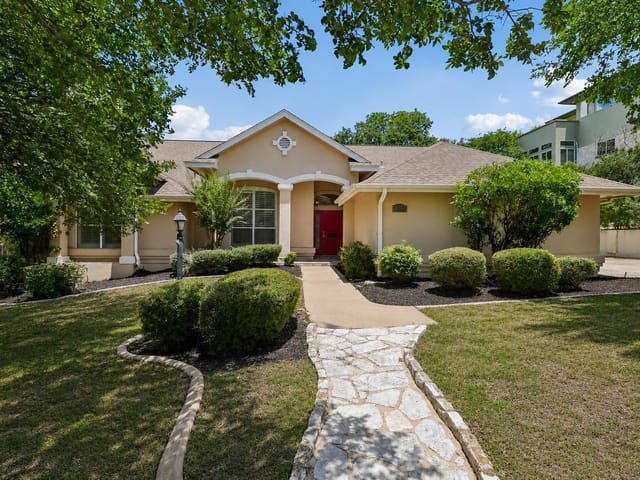 View 115 Tallstar DR in Lakeway Sec 20 115 Tallstar DR - front exterior - Luxury home in Lakeway Sec 20, Lakeway, TX