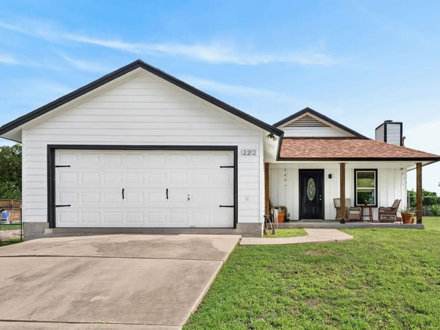 View 12212 Mustang DR in Mustang Ridge Estates Sec 01 12212 Mustang DR - front exterior - Luxury home in Mustang Ridge Estates Sec 01, Buda, TX