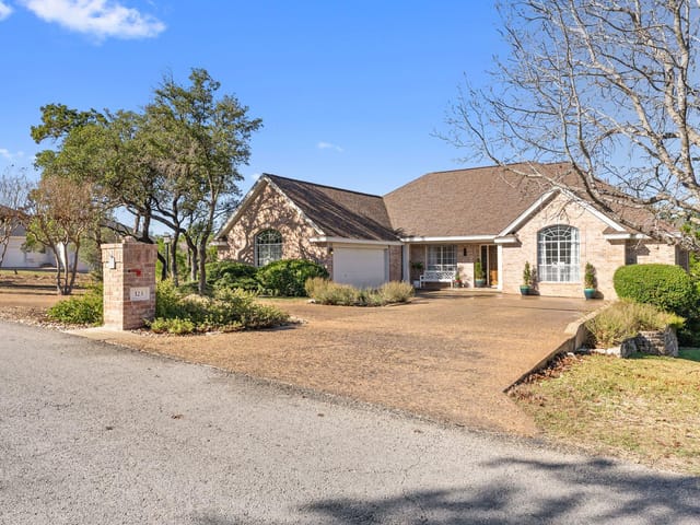 View 123 Clubhouse Dr in Lakeway Sec 28 123 Clubhouse Dr - front exterior - Luxury home in Lakeway Sec 28, Lakeway, TX