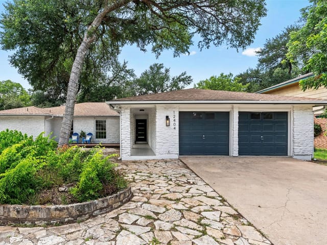 View 12404 Burlywood TRL in Anderson Mill/Deerbrook Village 12404 Burlywood TRL - property photo 1 - Luxury home in Anderson Mill/Deerbrook Village, Austin, TX