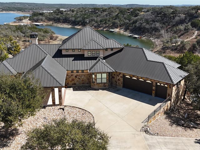 View 128 Carol CV 128 Carol CV - property photo 1 - Luxury home in Spicewood, TX