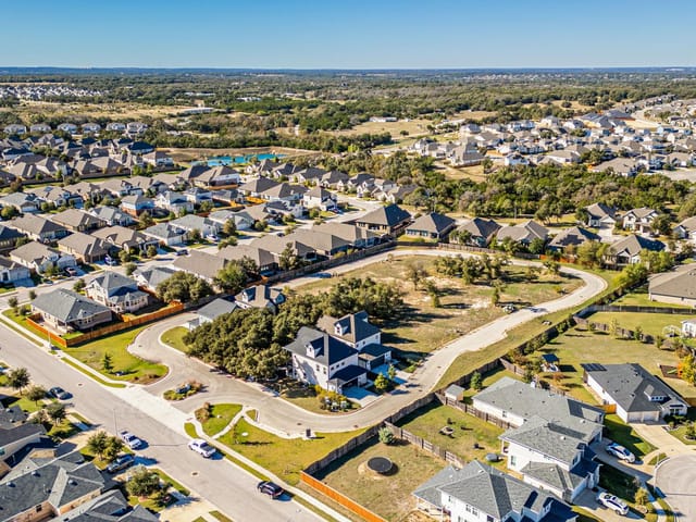 View 1301 Low Branch Ln Unit #3-15 in Cottages At Deerbrooke 1301 Low Branch Ln Unit #3-15 - front exterior - Luxury home in Cottages At Deerbrooke, Leander, TX