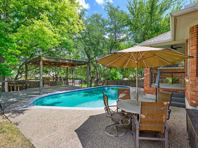 1309 Horseback HOLW - property photo 1 - Luxury home in Steiner Ranch, Austin, TX