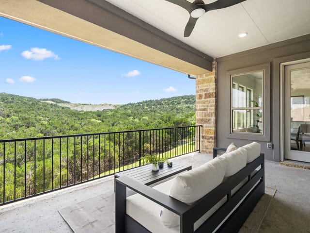 View 136 Baldovino SKWY in Lakeway Hlnds Ph 2 Sec 6 (Rough Hollow) 136 Baldovino SKWY - front exterior - Luxury home in Lakeway Hlnds Ph 2 Sec 6 (Rough Hollow), Lakeway, TX