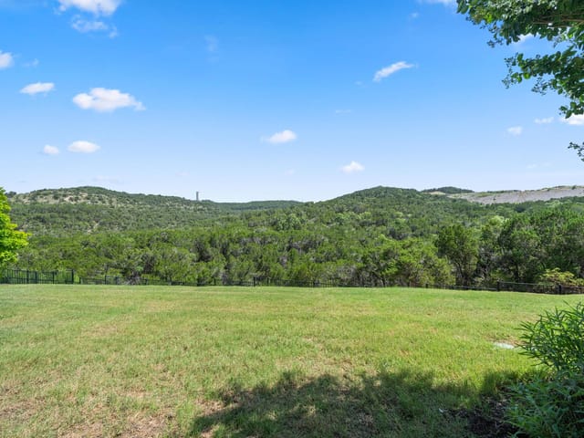 View 136 Baldovino SKWY in Lakeway Hlnds Ph 2 Sec 6 (Rough Hollow) 136 Baldovino SKWY - front exterior - Luxury home in Lakeway Hlnds Ph 2 Sec 6 (Rough Hollow), Lakeway, TX