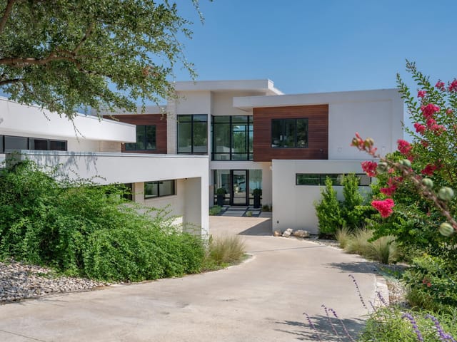 View 14419 Agarita RD Unit #D in Estates At Commanders Point 14419 Agarita RD Unit #D - front exterior - Luxury home in Estates At Commanders Point, Austin, TX