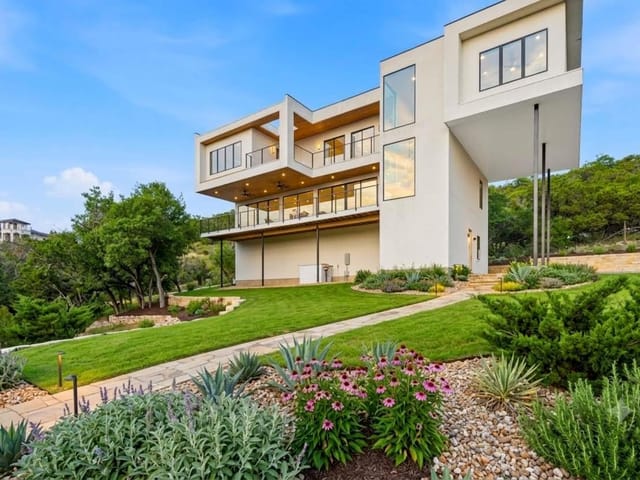 View 15424 FM 2769 Rd 15424 FM 2769 Rd - property photo 1 - Luxury home in Volente, TX