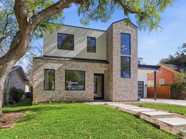 View 1702 W 30th ST in Brykerwoods F 1702 W 30th ST - front exterior - Luxury home in Brykerwoods F, Austin, TX