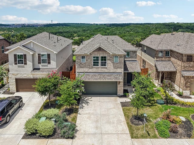 View 17307 Hattie TRCE in Sweetwater Ranch Sec 2 Vlgs C 17307 Hattie TRCE - front exterior - Luxury home in Sweetwater Ranch Sec 2 Vlgs C, Austin, TX