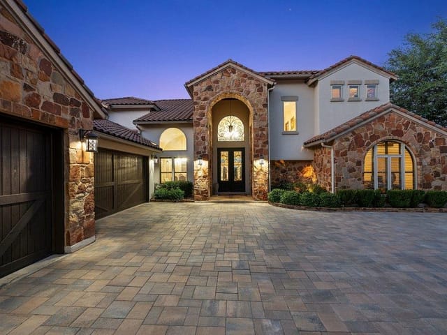 View 17508 Northlake Hills DR 17508 Northlake Hills DR - property photo 1 - Luxury home in Jonestown, TX