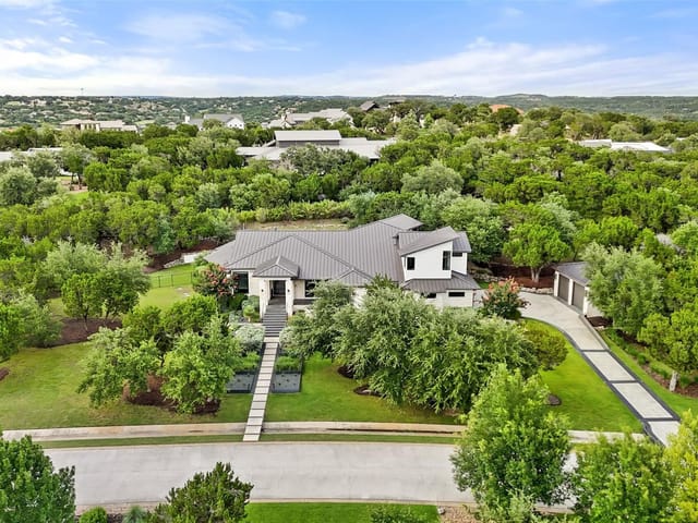 View 1817 Knights Chance LN in Reserve At Lake Travis 1817 Knights Chance LN - front exterior - Luxury home in Reserve At Lake Travis, Spicewood, TX