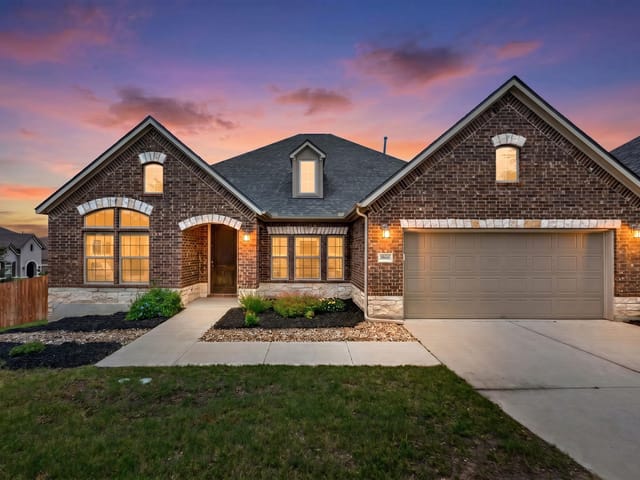View 18616 Tanner Bayou LOOP in Sweetwater Ranch Sec 1 Village 18616 Tanner Bayou LOOP - front exterior - Luxury home in Sweetwater Ranch Sec 1 Village, Austin, TX