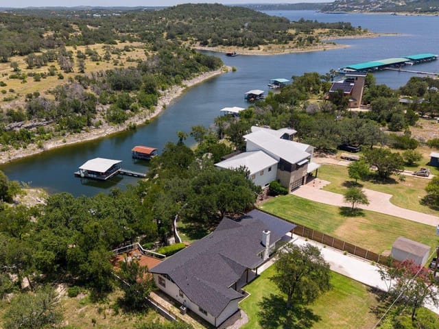 View 20100 Siesta Shores DR 20100 Siesta Shores DR - property photo 1 - Luxury home in Spicewood, TX