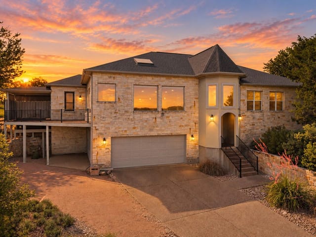 View 20510 Houston CV 20510 Houston CV - property photo 1 - Luxury home in Lago Vista, TX