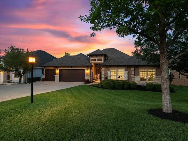 View 210 Lake Como Dr in North Lakeway Village Sec 06 210 Lake Como Dr - front exterior - Luxury home in North Lakeway Village Sec 06, Lakeway, TX