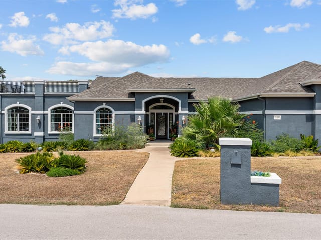 View 21508 Lake Park DR 21508 Lake Park DR - property photo 1 - Luxury home in Lago Vista, TX