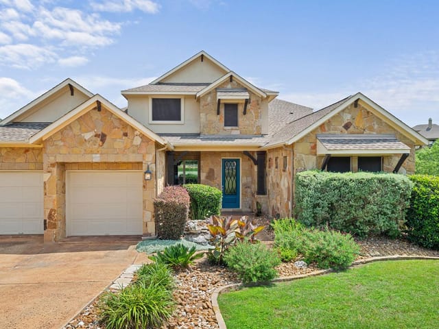 219 Great Cannon Ln - front exterior - Luxury home in Rough Hollow-Lakeway Highlands Ph 1 Sec 3, Austin, TX