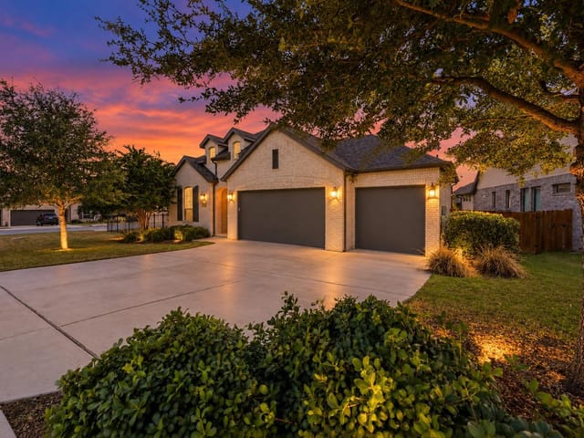 View 22601 Maidengrass LN 22601 Maidengrass LN - property photo 1 - Luxury home in Lago Vista, TX