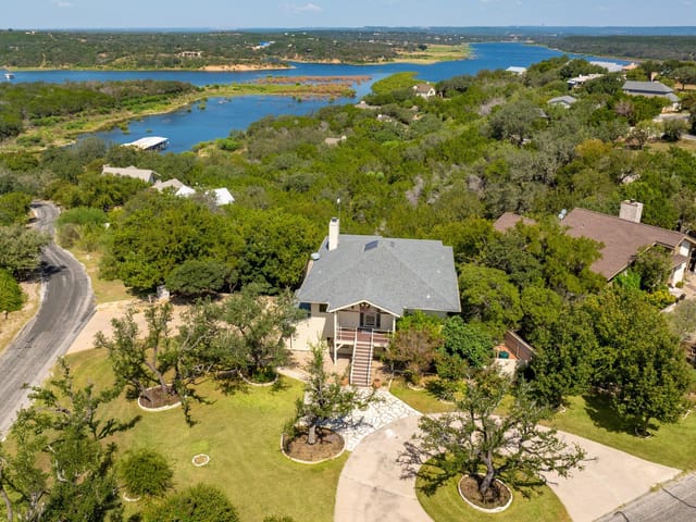View 313 Kendall DR 313 Kendall DR - property photo 1 - Luxury home in Spicewood, TX