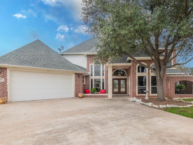 View 333 Wesley RDG 333 Wesley RDG - property photo 1 - Luxury home in Spicewood, TX