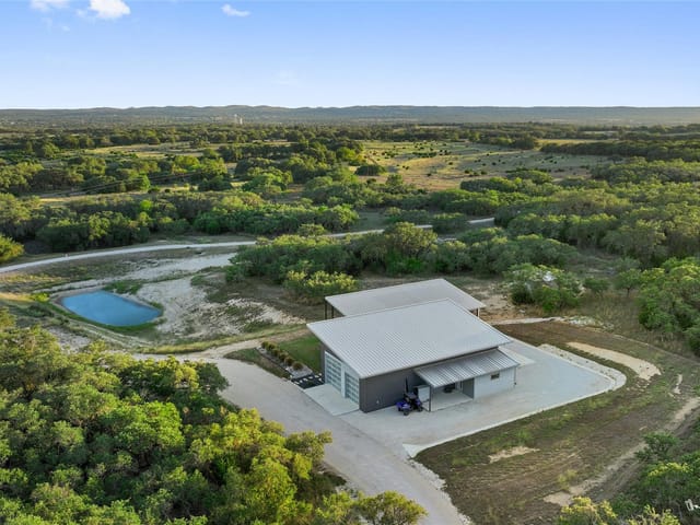View 370 Gray Wolf in The Hills of Madrone Ranch 370 Gray Wolf - front exterior - Luxury home in The Hills of Madrone Ranch, Blanco, TX