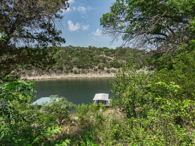 View 3721 Firemans TRL 3721 Firemans TRL - property photo 1 - Luxury home in Lago Vista, TX