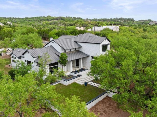 View 4018 Bee Creek RD 4018 Bee Creek RD - property photo 1 - Luxury home in Spicewood, TX