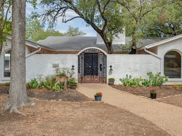 View 4202 N Hills DR in Northwest Hills Mesa Oaks Ph 4202 N Hills DR - front exterior - Luxury home in Northwest Hills Mesa Oaks Ph, Austin, TX