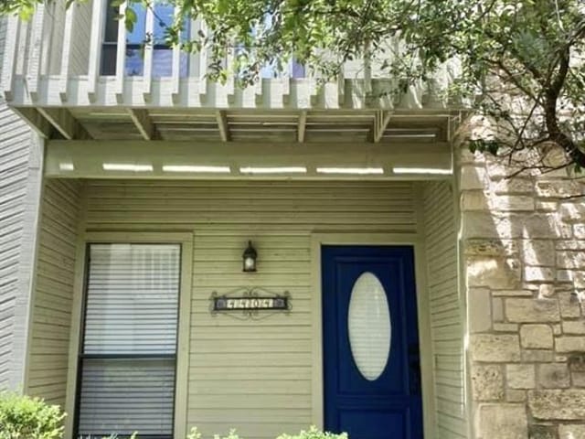 View 4404 Travis Country CIR Unit #G4 in Woods Travis Country Condo Ame 4404 Travis Country CIR Unit #G4 - front exterior - Luxury home in Woods Travis Country Condo Ame, Austin, TX