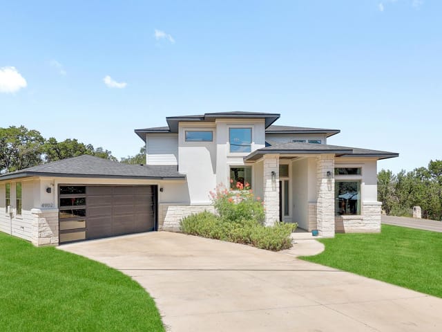 View 4902 Country Club DR 4902 Country Club DR - property photo 1 - Luxury home in Lago Vista, TX