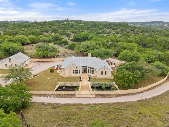 View 4915 Canyon Ranch TRL in Pedernales Canyon Ranch Ph 01 4915 Canyon Ranch TRL - front exterior - Luxury home in Pedernales Canyon Ranch Ph 01, Spicewood, TX