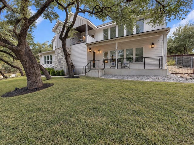 View 501 Alva DR 501 Alva DR - property photo 1 - Luxury home in Spicewood, TX