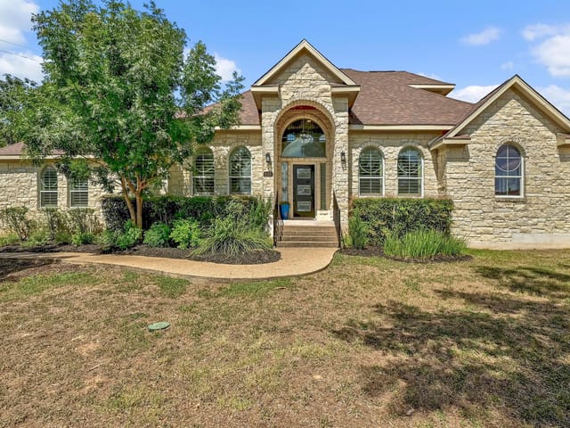 View 501 Flamingo Blvd in Lakeway Sec 11 501 Flamingo Blvd - front exterior - Luxury home in Lakeway Sec 11, Lakeway, TX